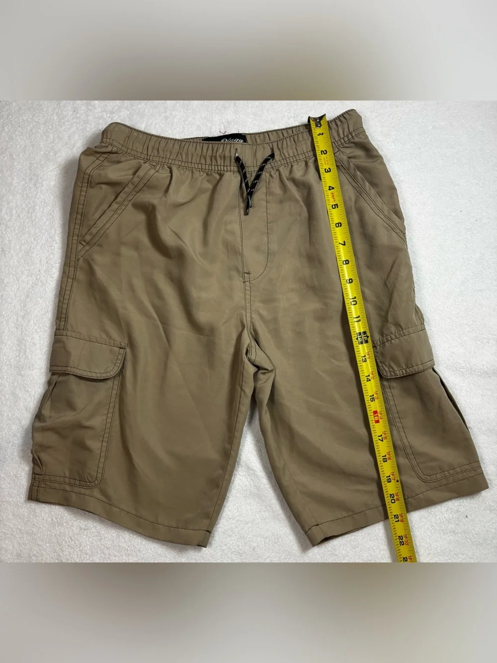 Plugg cargo Boy shorts with elastic waist, and multiple flap pockets